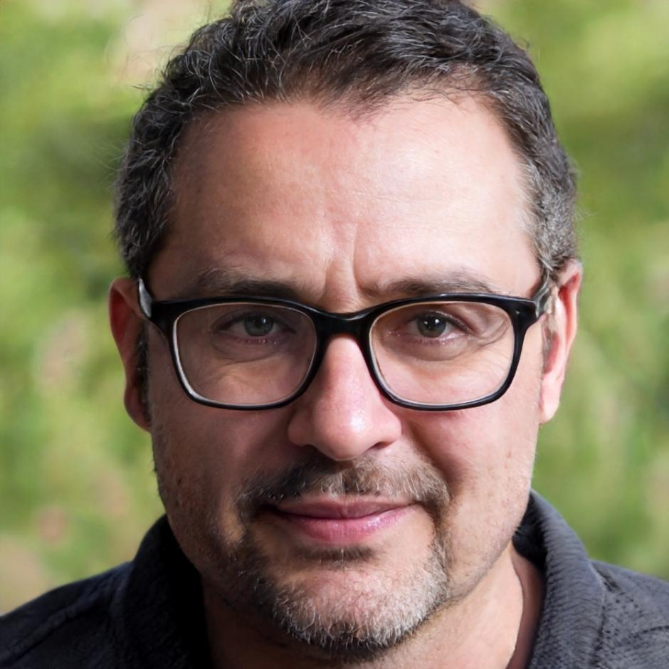 Professional headshot of financial systems expert Kieran Blackwell