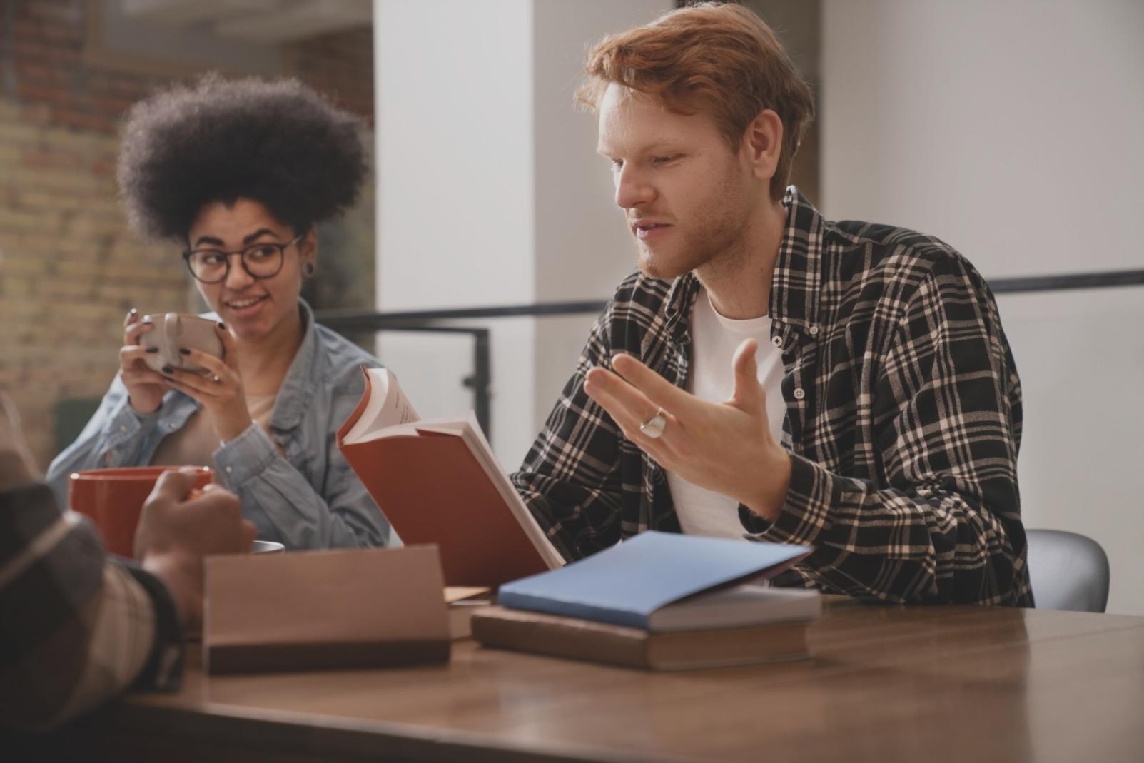 Modern office workspace showing digital workflow management on computer screens